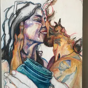 a man kissing a woman