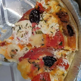 Savory tomato pie with goat cheese and herbs