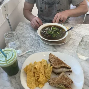 Cold pressed juice, chick pea sandwich , pho