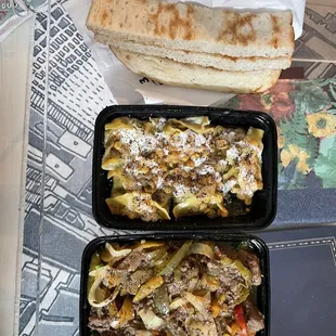 two trays of food on a table