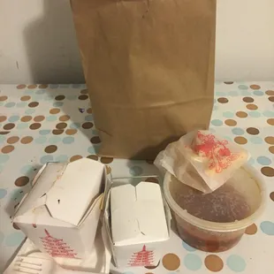 Take out boxes and hot and sour soup