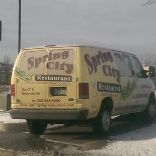 a van parked on the side of the road