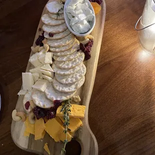 a platter of cheese and crackers