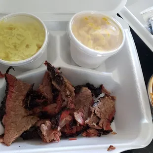 Brisket, marbled, BBQ dinner plate with potato salad and Mac &amp; cheese (x2) plus BBQ sauce to go. 4 breads