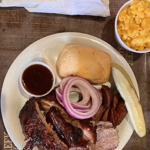 Three plate (brisket, baby back ribs, sausage) + corn and Mac n cheese