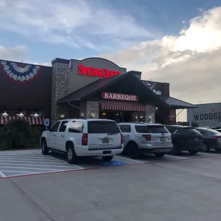 cars parked in front of the restaurant