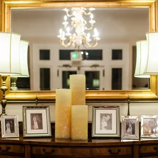 Directly across from the front doors is this beautiful, vintage table where we put photos of our parents and grandparents.