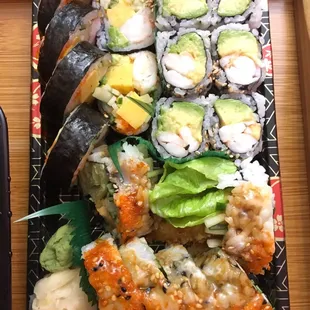 East Roll, shrimp avocado roll, and shrimp tempura roll on the bottom. All delicious.