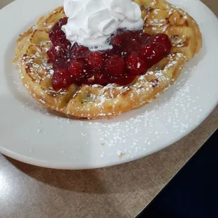 Pecan waffle with cherry topping
