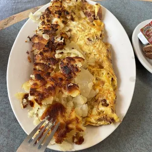 Bacon omelet with home fries