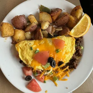 Taco omelette with seasoned potatoes.