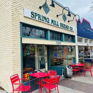 red tables and chairs outside