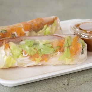  a plate of food with a dipping sauce