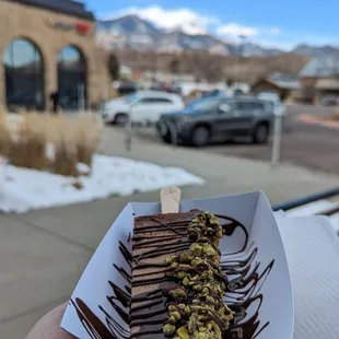 Chocolate Abuelita, half dipped dark chocolate pistachio topping.. absolutely amazing .