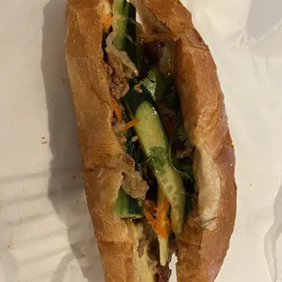 Pork Banh Mi with butter, carrots, cucumber and cilantro