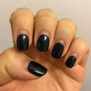 Gel mani exactly 3 weeks later! No chips or lifts yet. It's hard to tell but this is a super dark shimmery green.