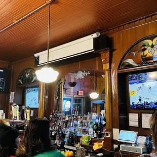 people sitting at the bar