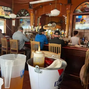 a bucket of beer and a bucket of ice cream