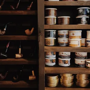 shelves of tobacco and tobacco pipes