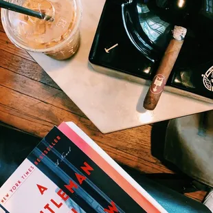 a book and a drink on a table