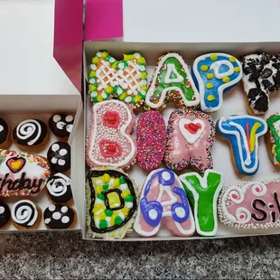 a box of happy birthday donuts