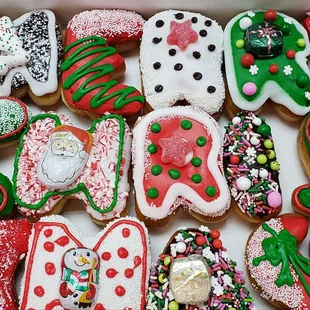 a box of decorated christmas cookies