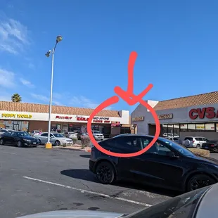 Located hidden between barbershop and CVS.