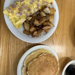 an omelet, pancakes, and coffee