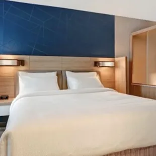 Clean and comfortable king bed in the King Suite