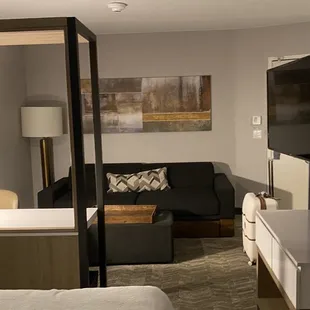 Standard room - nice living area and work desk. However, see last photo for what I saw when I turned down the bed