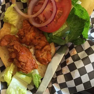 Two tiny boneless wings on this bun counts as a buffalo chicken sandwich? Really?