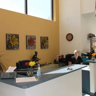 SpringStone staff manage the school in an open concept office, built for parent involvement and open communication