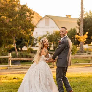 Happy couple taking sunset photos