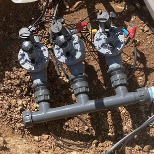 Manifold and sprinkler valves with rain bird controller.  Love it.