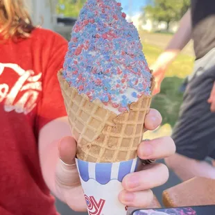 Vanilla with cotton candy crunch in a waffle cone.