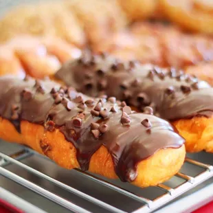 Triple Threat Chocolate Chip Donut. Chocolate frosting, chocolate chips on top and chocolate chips slightly melted inside the dough!