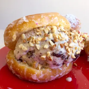 Cookies n' cream Donut Ice Cream Sandwich with nuts, only at Sprinkles Donuts!