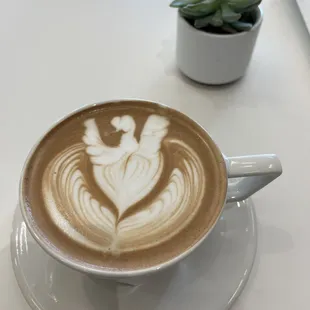 a cup of coffee on a saucer