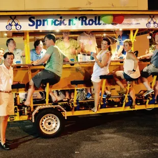 Hopping of the party bike for a drink special at a local bar.