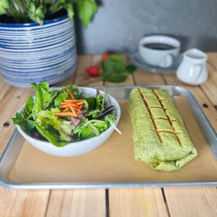 Breakfast burrito on spinach tortilla.