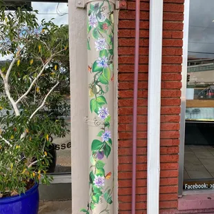 Admiring this Cute Painting outside while waiting for my order