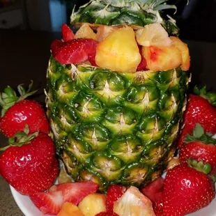 Scrumptious pineapple filled with fresh fruit from sprouts