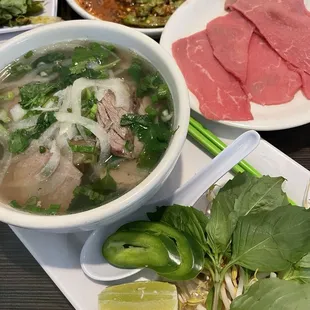Pho deluxe (eye round on the side - we like to squeeze lime juice on it and dip it in the broth for a rare cook)