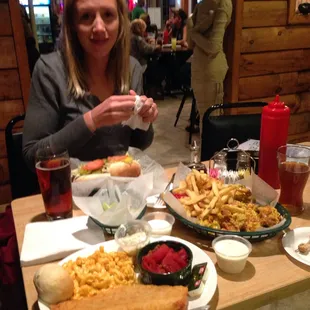 Fried haddock with Mac and Cheese. Fried Jalepeno Cheddar wings. Super Cheese Steak. Those wings are covered in Nacho Cheese.