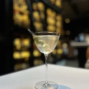 Dirty martini with their house made blue cheese stuffed olives.