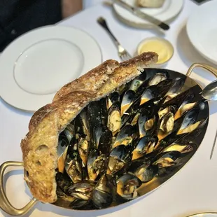 Muscles. If you don't dip the bread in the broth you doing it all wrong!