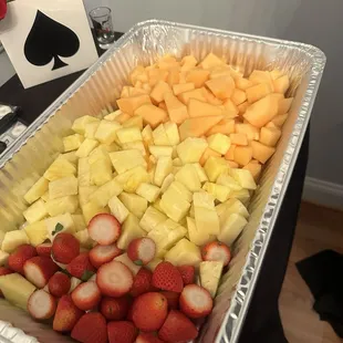 Sloppy work, catering where? Why are leaves all over the strawberries