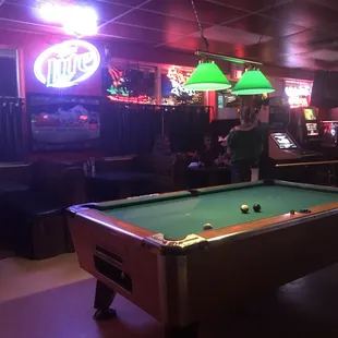 a man playing pool