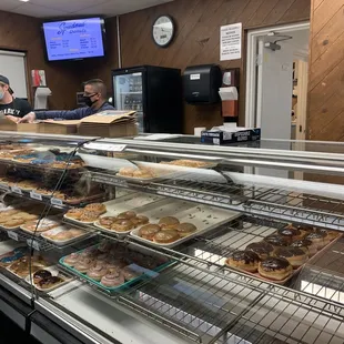 a man and a woman in a bakery
