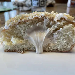 Inside of coconut cream donut.